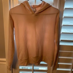 Athleta girl light pink hoodie.